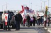 Protesters block traffic at the Ambassador Bridge, linking Windsor, Ontario and Detroit on Wednesday, February 9, 2022. The demonstration in solidarity with protests in Ottawa against COVID-19 restrictions blocked traffic into Canada on the Ambassador Bridge linking Windsor and Detroit. It is the single busiest commercial crossing in North America. THE CANADIAN PRESS/Nicole Osborne