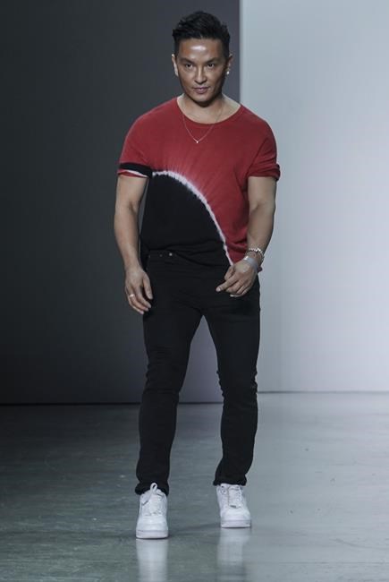 Fashion designer Prabal Gurung takes the runway after unveiling his latest collection during Fashion Week, Wednesday, Feb. 16, 2022, in New York. (AP Photo/Bebeto Matthews)
