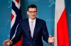 Polish Prime Minister Mateusz Morawiecki holds a joint press conference with Norway's Prime Minister Jonas Gahr Støre in the Government's official residence in Oslo, Tuesday, March 8, 2022. (Stian Lysberg Solum/NTB via AP)