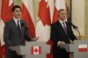 Prime Minister Justin Trudeau, left, talks to journalists during a joint press conference with Poland's President Andrzej Duda on the occasion of their meeting at Belwelder Palace, in Warsaw, Poland, Thursday, March 10, 2022. THE CANADIAN PRESS/AP-Czarek Sokolowski