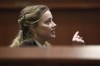 Actor Amber Heard appears in the courtroom at the Fairfax County Circuit Court in Fairfax, Va., Thursday, April 21, 2022. Actor Johnny Depp sued his ex-wife Amber Heard for libel in Fairfax County Circuit Court after she wrote an op-ed piece in The Washington Post in 2018 referring to herself as a 