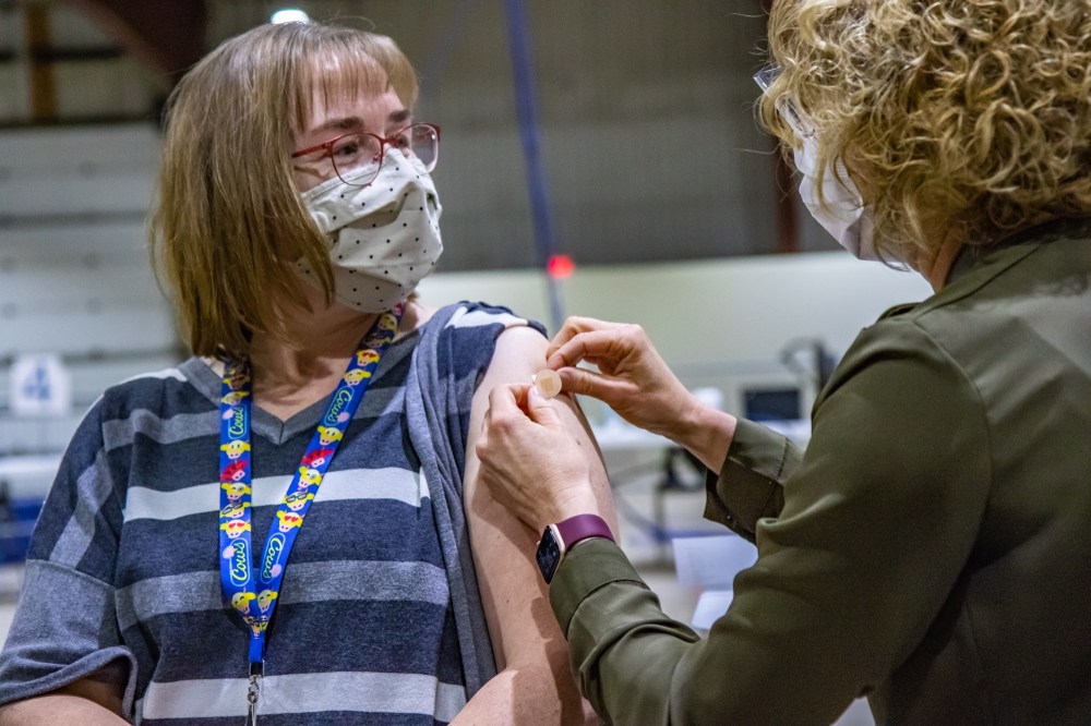 A dose of COVID-19 vaccine is administered at the Keystone Centre super site earlier this year. (File)