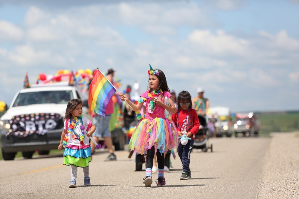 Tyler Clarke/The Brandon Sun
The first-ever Waywayseecappo Pride Parade is seen making its way down Highway 45 on Saturday afternoon, headed by enthusiastic participant Nayeli Brandon, centre.