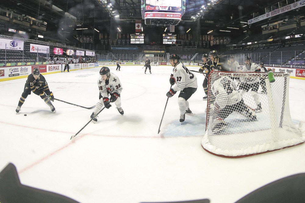Keith Hershmiller Photography
Brandonite Cole Jordan (37) of the Moose Jaw Warriors, shown defending against Ridly Greig and the Brandon Wheat Kings at the Brandt Centre in the East Division hub in March, is ranked 88th among North American skaters by Central Scouting.