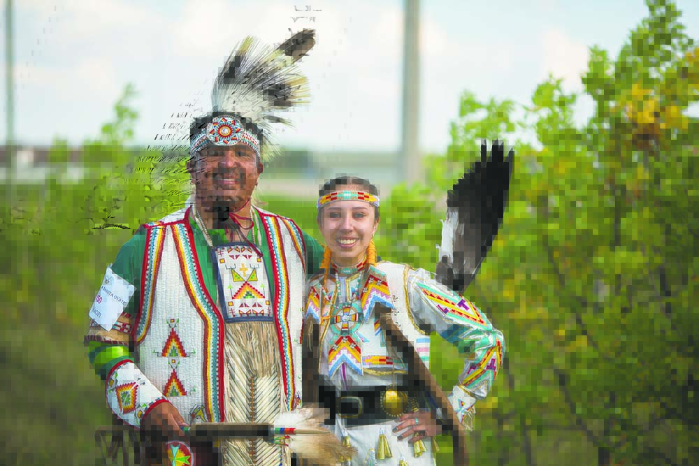 Chelsea Kemp/The Brandon Sun
Dakota Plains First Nation members Don Smoke and his daughter Sophia Smoke attend the Canupawakpa Dakota Oyate One Day Contest Wacipi on Sept. 4.
