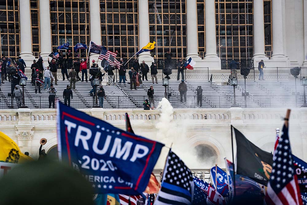 Alex Edelman/AFP/Getty Images/TNS
Supporters of Donald Trump clash with the U.S. Capitol police during a riot at the U.S. Capitol on Jan. 6, in Washington, D.C.