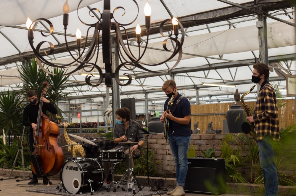 Chelsea Kemp/The Brandon Sun
A Brandon University collective of jazz musicians performs outside The Secret Garden Café by Chez Angela during the Green Spot grand opening Saturday.