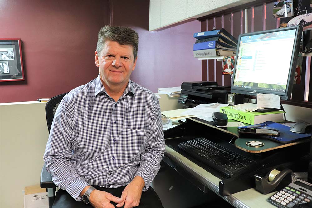 Kyle Darbyson/The Brandon Sun
John Zeke poses for a photo in his downtown Brandon office on Saturday afternoon.
