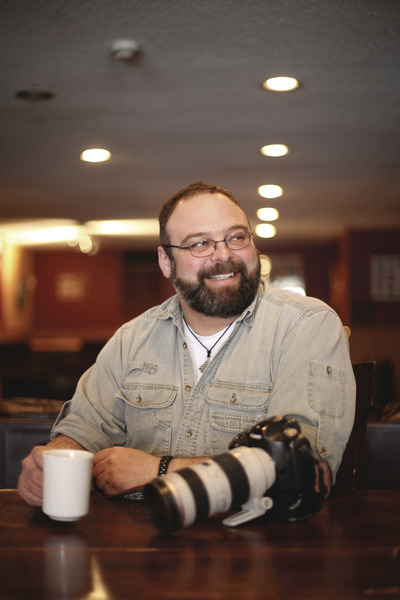 Tim Smith / Brandon Sun
For the past 15 years, Bruce Bumstead has been known around the community as an affable Brandon Sun photographer. But the Ontario native is also actively involved in the Scouting movement. Four weeks ago, he became the Area Commissioner for the Westman Service Area of Scouts Canada. He’s responsible for overseeing groups in Souris, Virden, Dauphin, Neepawa, and three in Brandon, and will join in festivities over the next few days during Scout/Guide Week, which marks founder Baden Powell’s birthday on Feb. 22.