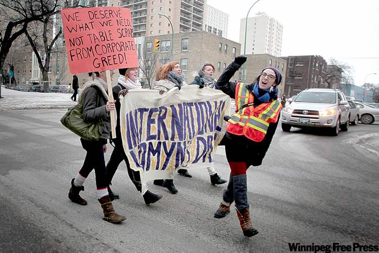 MIKE.DEAL@FREEPRESS.MB.CA
More than 200 people in downtown Winnipeg take part in march marking International Women�s Day.