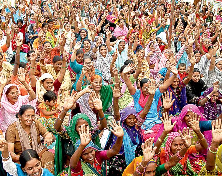 CP
Ajit Solanki / the associated press
Indian women raise their hands as they shout slogans during a protest on International Women�s Day in Ahmedabad, India.