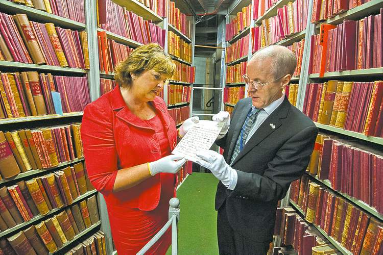 Photos by Chris Watt
Cabinet secretary Fiona Hyslop and George MacKenzie examine historic letter.