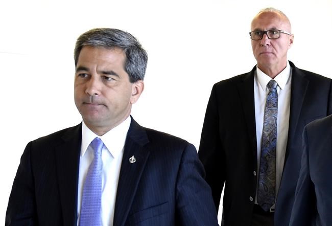 Conservative MPs Pierre Paul-Hus, left, and Glen Motz arrive for a meeting of the Standing Committee on Public Safety and National Security in Ottawa on Monday, July 15, 2019. The Conservatives want to know what federal officials are doing about China's alleged involvement in the theft of data from thousands of Canadians.THE CANADIAN PRESS/Justin Tang