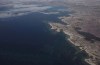 Canadian archeologists are on their way to a remote area in the Arctic Circle for another chance to dig up the secrets held by the Franklin expedition wrecks, Parks Canada announced Friday. Terror Bay, where the sunken ship the HMS Terror lies, is seen from the air near Gjoa Haven, Nvt., on Sept. 3, 2017. THE CANADIAN PRESS/Jason Franson