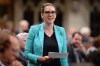 NDP MP Ruth Ellen Brosseau asks a question during Question Period in the House of Commons in Ottawa on Thursday, May 28, 2015. The House of Commons erupted in chaos Wednesday as a New Democrat MP and her opposition colleagues accused Prime Minister Justin Trudeau of elbowing her in the chest during a confrontation prior to a key vote. THE CANADIAN PRESS/Sean Kilpatrick