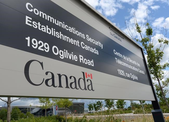 A sign for the Government of Canada's Communications Security Establishment (CSE) is seen outside their headquarters in the east end of Ottawa on Thursday, July 23, 2015. The national cyberspying agency monitored a Canadian citizen, contrary to policy, for several years due to a series of internal mistakes, a newly released watchdog report says. THE CANADIAN PRESS/Sean Kilpatrick