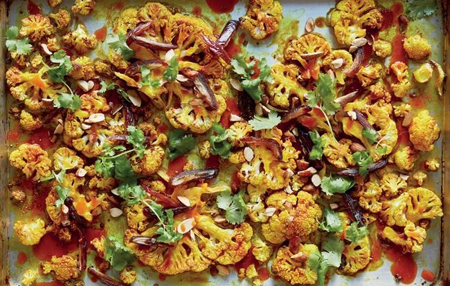 An image of cauliflower steaks with turmeric and crunchy almonds from Antoni Porowski's cookbook is shown in this handout image. THE CANADIAN PRESS/HO-Raincoast Books *MANDATORY CREDIT*