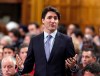 Prime Minister Justin Trudeau stands in the House of Commons during Question Period in Ottawa, Tuesday, March 8, 2016. THE CANADIAN PRESS/Fred Chartrand