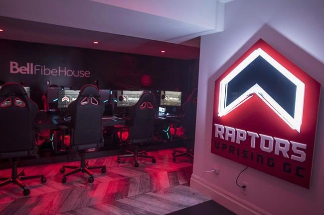 Raptors Uprising GC ran its win streak to 12 and clinched a playoff berth Thursday, holding off the Gen.G Tigers in an international matchup in NBA 2K League play. The gaming area for the Raptors Uprising GC is seen at the Bell Fibe House in Toronto on Thursday, June 21, 2018. THE CANADIAN PRESS/ Tijana Martin