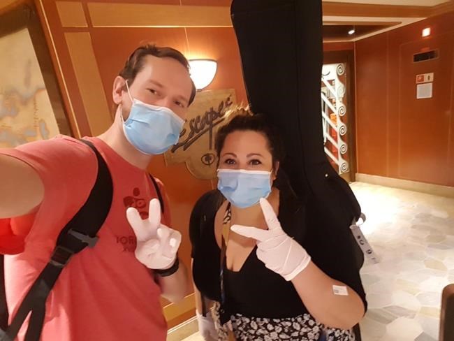 Michelle Joly and Jonah Danniels pose in this recent handout photo. Canadians working aboard two cruise ships who weren't allowed to come to shore because of concerns about COVID-19 are finally able to return home. Princess Cruises said in an emailed statement that 19 Canadians on the Koningsdam disembarked in Los Angeles on Friday, and that they would be flown or driven home by the company. The cruise line said another 53 Canadians were scheduled to leave the Emerald Princess in Fort Lauderdale, Fla., on Saturday and would head to Miami where they would board a chartered flight to Toronto.