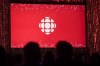 The CBC logo is projected onto a screen in Toronto on May 29, 2019. The CBC says it's accelerating efforts to meet diverse hiring, retention and promotion goals after its Yukon Morning radio show host lambasted the broadcaster for its failings live on-air. The public broadcaster says that by 2021–22, it wants half of all new hires for executive and senior management positions to be Indigenous people, visible minorities, or people with disabilities. It also plans to double retention and promotion rates for people from these three groups. THE CANADIAN PRESS/Tijana Martin