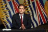 Health Minister Adrian Dix looks on during a press conference in the rotunda at Legislature in Victoria, B.C., on Wednesday May 6, 2020. The deaths of two more COVID-19 patients at long-term care homes in B.C. were mourned by provincial health officials Thursday, but they said lives may have been saved by the province's quick response to the pandemic.THE CANADIAN PRESS/Chad Hipolito