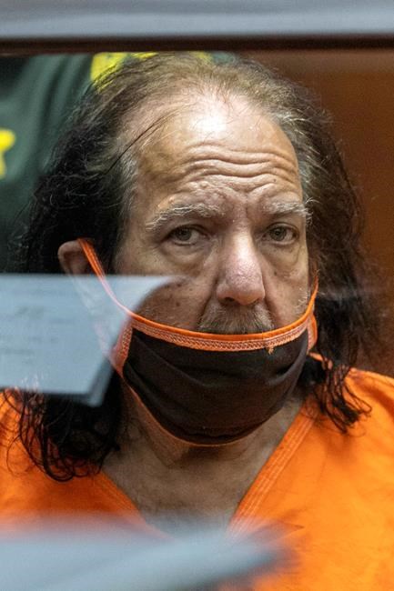 Adult film star Ron Jeremy appears for his arraignment on rape and sexual assault charges at Clara Shortridge Foltz Criminal Justice Center, Friday, June 26, 2020, in Los Angeles. Jeremy pleaded not guilty to charges of raping three women and sexually assaulting a fourth. (David McNew/Pool Photo via AP)