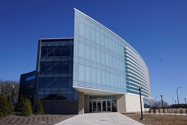 Exterior of the University of Michigan's Ford Motor Co. Robotics Building is seen, March 12, 2021 in Ann Arbor, Mich. The four-story, $75 million, 134,000-square-foot complex has three floors that house classrooms and research labs for robots that fly, walk, roll and augment the human body. (AP Photo/Carlos Osorio)
