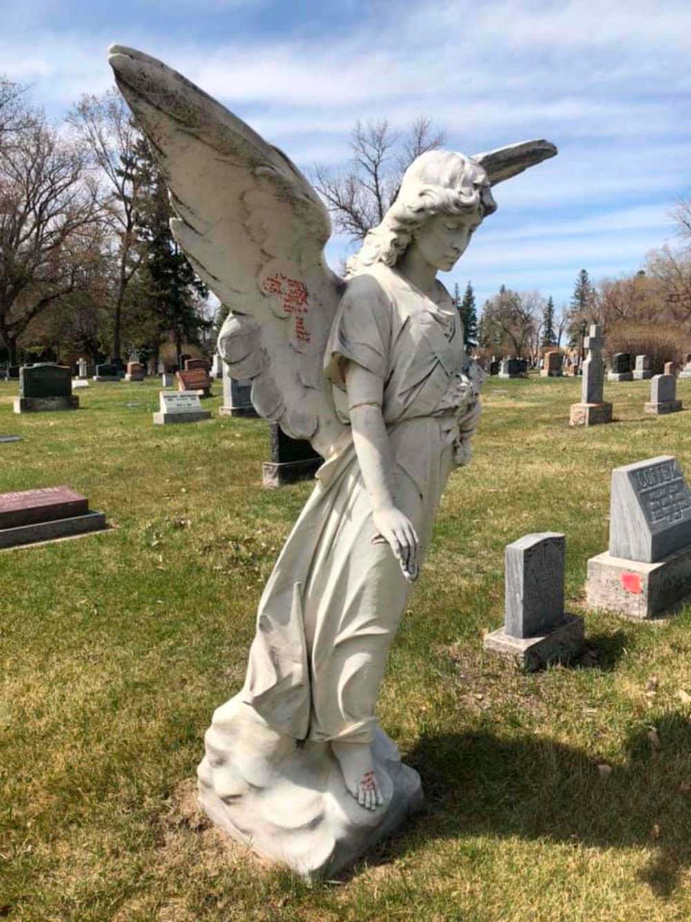 A photo posted to the People of Brandon Facebook group showing the vandalism to the angel statue. (Facebook)