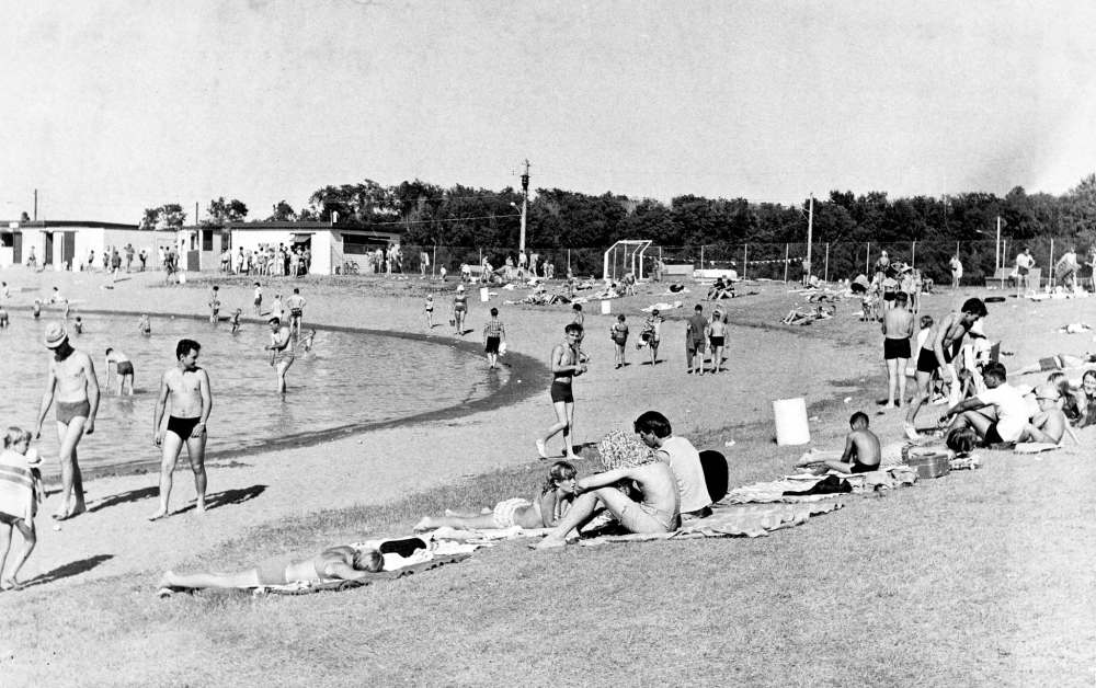 Brandonites enjoy the lake at Curran Park in 1960. The park, which was on land leased by the city from the nearby residential school, is now a private campground called Turtle Crossing. (SJ McKee Archives, Brandon University)