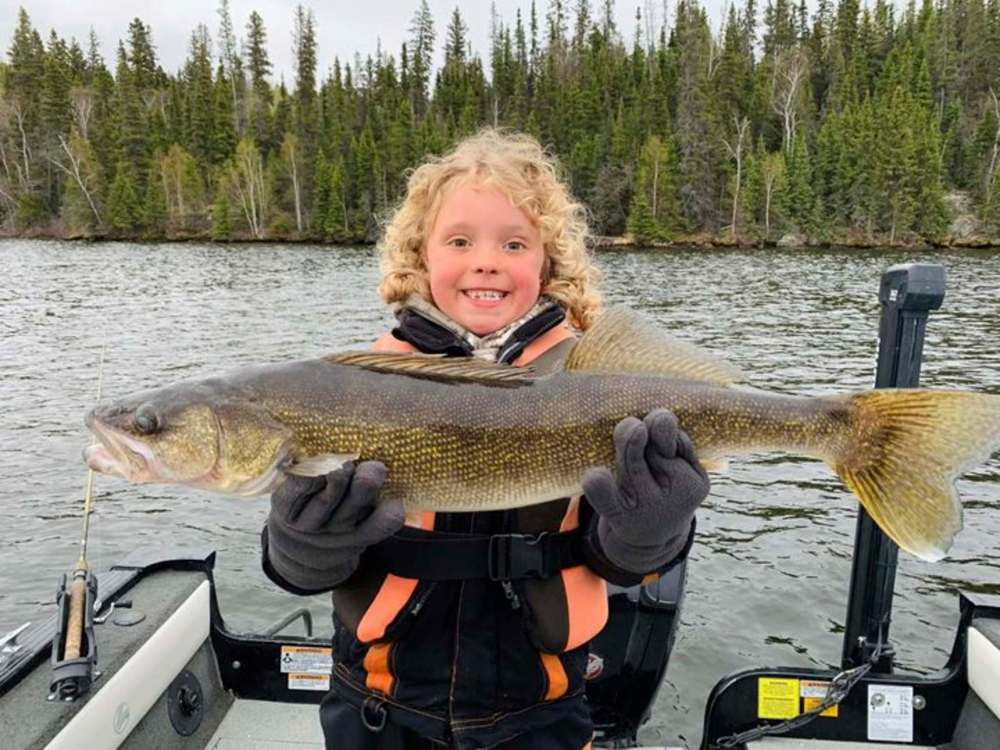 Paisley Connolly, 6, is seen with one of the fish she caught during the On The Other Line Canada fishing contest thus far. (Submitted)