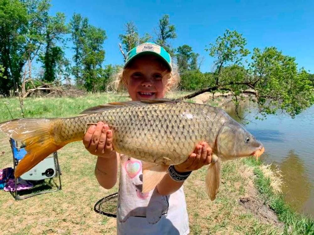 Paisley Connolly, 6, is seen with one of the fish she caught during the On The Other Line Canada fishing contest thus far. (Submitted)