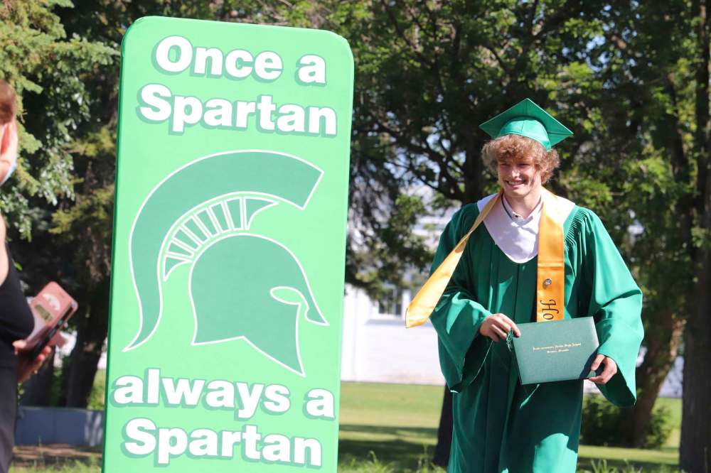 Liam Dickie wears a giant smile after officially receiving his diploma during Monday’s École Secondaire Neelin High School graduation ceremony. Dickie told the Sun afterwards that he plans to attend Brandon University this fall to study science. (Kyle Darbyson/The Brandon Sun)