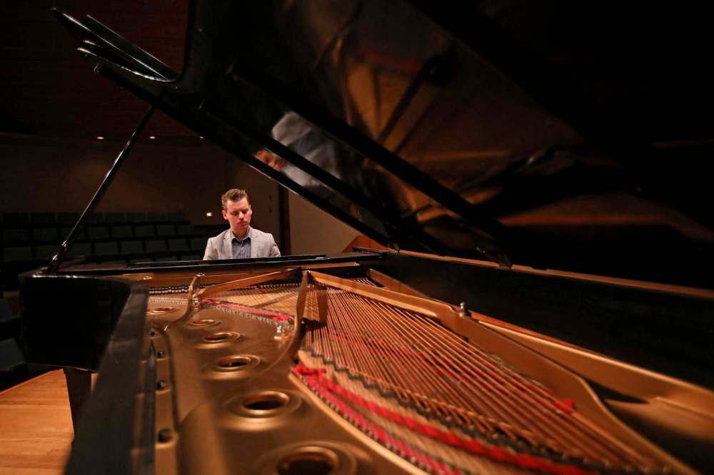Daniel Tselyakov is shown here in 2018 at Brandon University's Lorne Watson Recital Hall. The renowned pianist, and co-chair of the Chamber Lake Music Festival 2023, will perform alongside gospel and classical singer Monika Wall in a concert called Unforgettable Holiday Lights.( File)