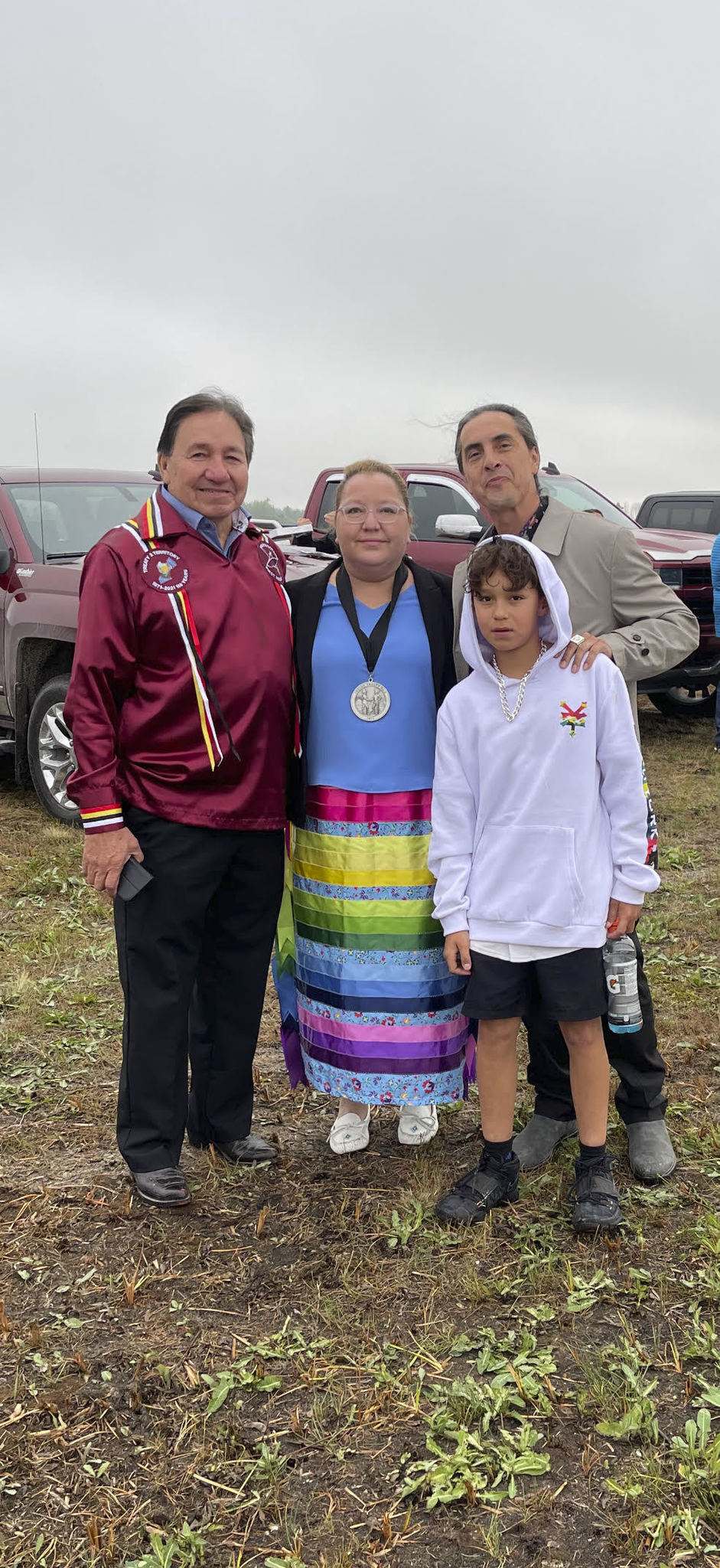 Regional Chief of the Assembly of First Nations in Manitoba Cindy Woodhouse, with her father, Chief Garnet Woodhouse of Pinaymootang First Nation (left), Grand Chief, Arlen Dumas of the Assembly of Manitoba Chiefs and her son Kyler. (Submitted)