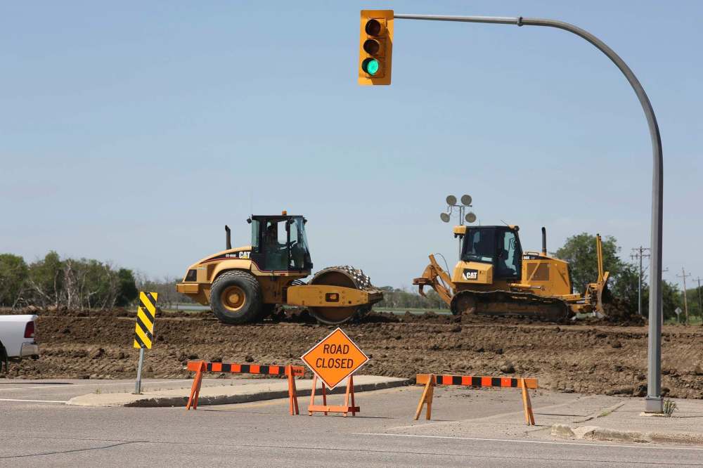 Grand Valley Road dike plug installed Brandon Sun
