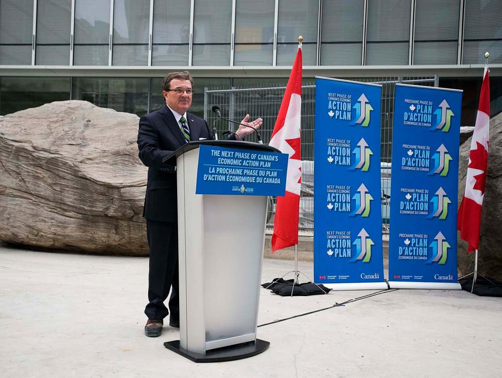 Finance Minister Jim Flaherty speaks at the newly refurbished School of Image Arts building at Ryerson University in Toronto in 2011. Federal funding was provided for the renovations through the Government of Canada’s Knowledge Infrastructure Program. (The Canadian Press)
