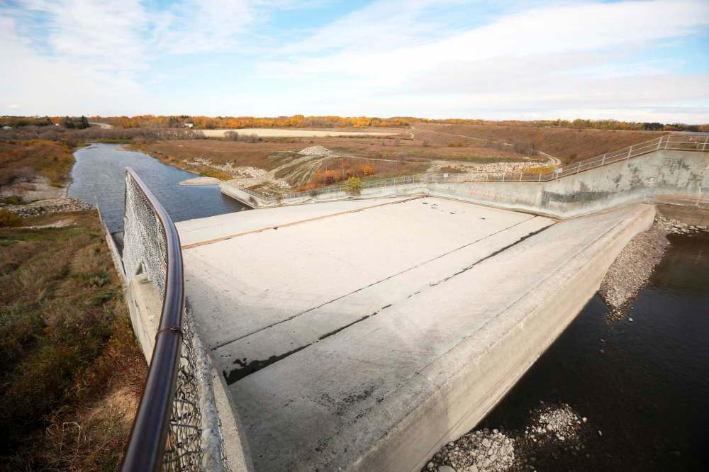06102020
The Rivers dam spillway sits dry on Tuesday as the water level on the Rivers Reservoir remains low. (Tim Smith/The Brandon Sun)