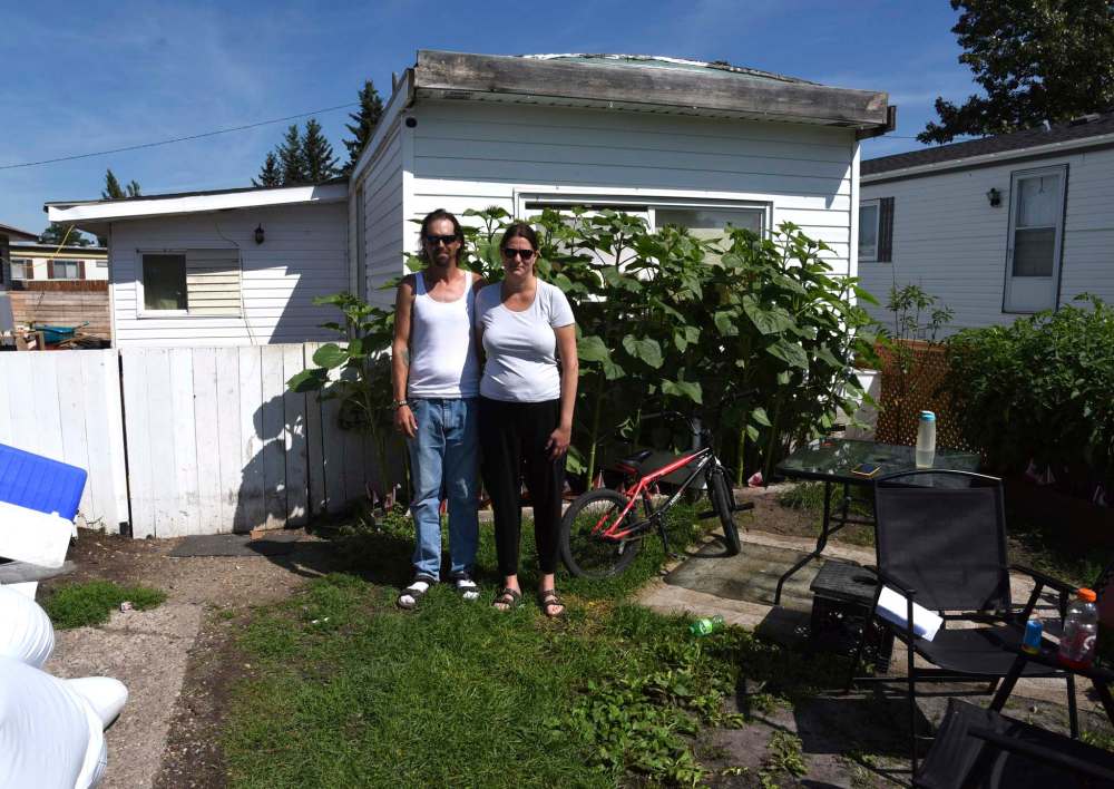 Brandon Sun Bill and Stephanie Fraser stand outside their mobile home at Glendale Mobile Homes Park. They and 22 other residents have been told they have to move their homes by the end of October 2021. (Bud Robertson/The Brandon Sun)