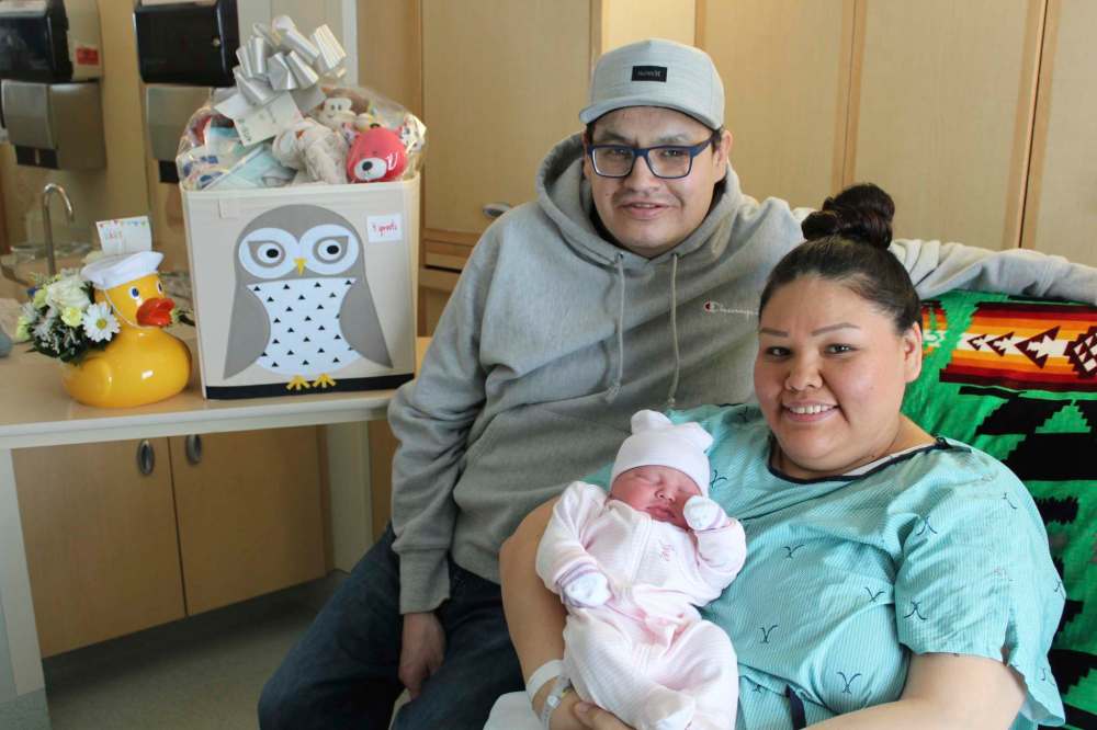 Les Paul Roulette and Misty Brown with new baby, Zoey. Baby Zoey is the first birth of 2021 in Brandon. (Submitted)