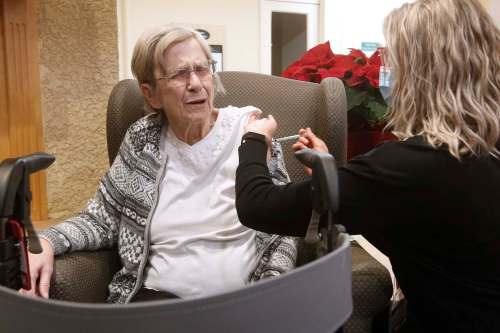 Paramedic Jessi Bittner inoculates Margaret Watson, 94, a resident at Oakview Place Long Term Care Residence, on Jan. 11. Columnist Kerry Auriat said this week Dr. Joss Reimer advised Manitobans that she is “personally very excited that we’re expanding into the general population, and I’m looking forward to decreasing the age of eligibility over time.” (The Canadian Press)