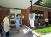 A person leaves as other people line up to be tested at a COVID-19 assessment centre in Toronto on Tuesday, May 26, 2020. THE CANADIAN PRESS/Nathan Denette