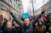 FILE - In this file photo taken on Sunday, Jan. 28, 2018, Russian opposition leader Alexei Navalny, centre, attends a rally in Moscow, Russia. (AP Photo/Evgeny Feldman, File)