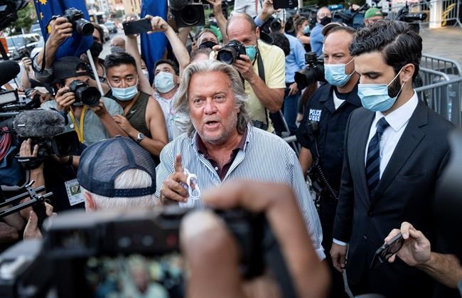 President Donald Trump's former chief strategist Steve Bannon leaves federal court, Thursday, Aug. 20, 2020, after pleading not guilty to charges that he ripped off donors to an online fundraising scheme to build a southern border wall. (AP Photo/Craig Ruttle)