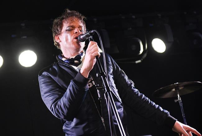 FILE - This March 12, 2020 file photo shows actor and singer Michael C. Hall performing with his band Princess Goes To The Butterfly Museum in New York. The indie rockers may be in the unenviable position of trying to launch their career during a global pandemic, but they have a few things going for them — they're all seasoned musicians and they have a celebrity. Hall, known from the series