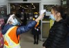 People get their temperatures tested at the T&T grocery store to help curb to spread of COVID-19 in Markham, Ont., on Monday, April 20, 2020. Only a few months ago they looked like something out of a sci-fi film, but fever scanners are now becoming regulation for some Canadian businesses such as Air Canada in the battle against COVID-19.Running a fever? You're grounded. THE CANADIAN PRESS/Nathan Denette