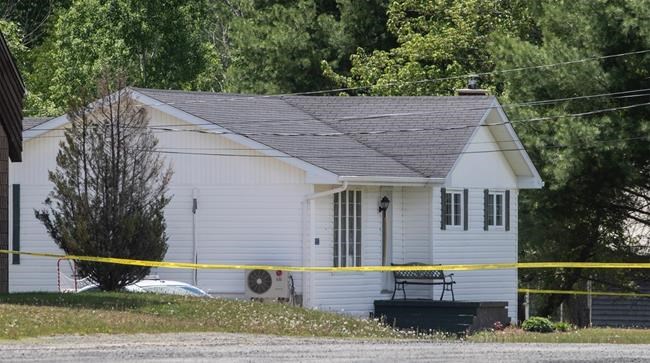 A house is surrounded by police tape where a man was shot on Friday night, near Miramichi, N.B. on Saturday, June 13, 2020. A section of route 425 was blocked to through traffic. The man fatally shot by New Brunswick RCMP Friday night has been identified by social media posts as Rodney Levi, 48, of the Metepenagiag First Nation. THE CANADIAN PRESS/Ron Ward