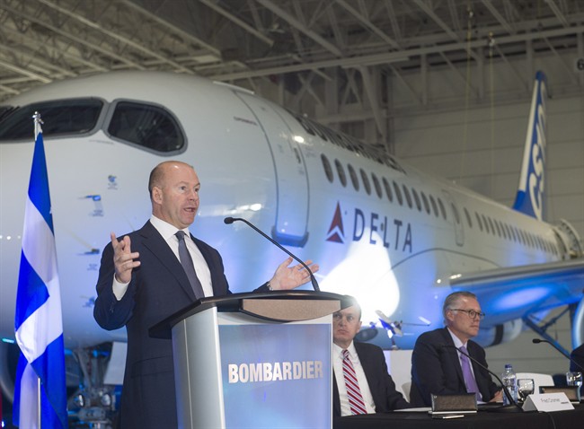 Bombardier's chief executive Alain Bellemare, left, speaks to the media as Bombardier Aircraft President Fred Cromer, ,Delta Airlines chief executive Ed Bastian, right, look on at the company's plant Thursday, April 28, 2016 in Mirabel, Que. Delta has signed a deal to purchase 75 CS100 aircraft. THE CANADIAN PRESS/Ryan Remiorz