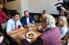 Liberal Leader Justin Trudeau speaks with people in a cafe as he mainstreets in downtown Winnipeg on Thursday, Sept.19, 2019. THE CANADIAN PRESS/Sean Kilpatrick