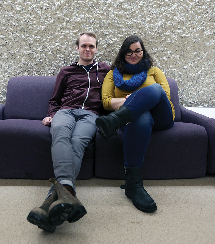 Aren Teerhuis, left, and Megan Pokrant sit on the iconic purple chairs of the Brandon University School of Music building. (Michael Lee/The Brandon Sun)